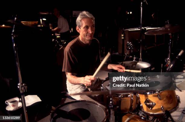 British musician Charlie Watts of the Rolling Stones performs on stage during the band's 'Voodoo Lounge' tour, late 1994.