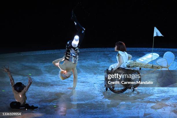 Entertainers perform during the opening ceremony of the Tokyo 2020 Paralympic Games at the Olympic Stadium on August 24, 2021 in Tokyo, Japan.