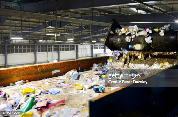 Recycling conveyor belt at the Lampton 360 Recycling Centre on August 18,2021 in London, United Kingdom. Lampton 360 Recycling Centre Recycle 360 was...