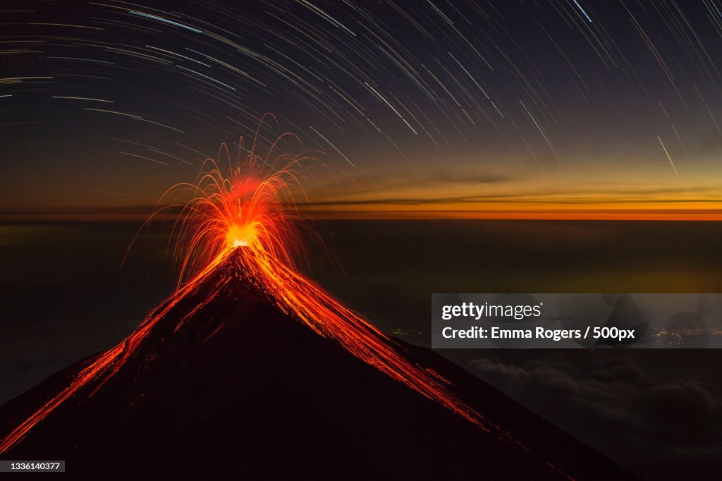 Scenic view of star trails over landscape against sky at night,Chimaltenango Department,Guatemala
