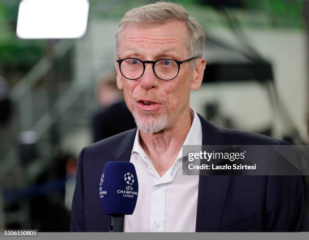 Head coach Peter Stoger of Ferencvarosi TC is interviewed prior to the UEFA Champions League Play-Offs Leg Two match between Ferencvarosi TC and BSC...