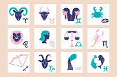 Colorful set of zodiac signs on pink background