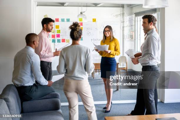 group of workers social distancing in a business meeting at the office - executive board meeting stock pictures, royalty-free photos & images