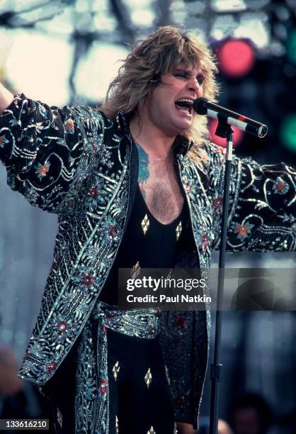 British musician Ozzy Osbourne performs with Black Sabbath on stage at John F. Kennedy Stadium for the Live Aid Concert, Philadelphia, Pennsylvania,...