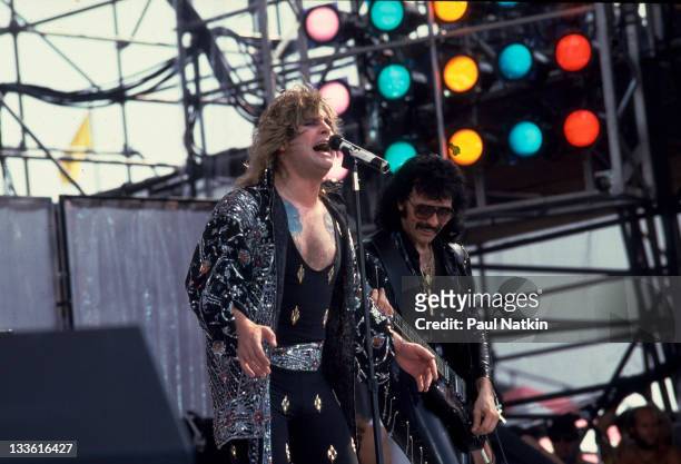 British musicians Ozzy Osbourne and Tony Iommi perform with Black Sabbath on stage at John F. Kennedy Stadium for the Live Aid Concert, Philadelphia,...
