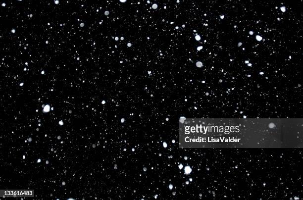 flocos de neve - fundo preto imagens e fotografias de stock