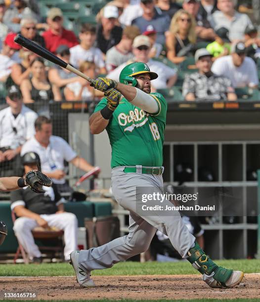 Mitch Moreland of the Oakland Athletics bats against the Chicago White Sox at Guaranteed Rate Field on August 19, 2021 in Chicago, Illinois. The...