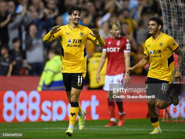 Francisco Trincao of Wolverhampton Wanderers celebrates after scoring their team's third goal during the Carabao Cup Second Round match between...