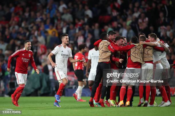 Julian Weigl of SL Benfica celebrates with teammates after the UEFA Champions League Play-Offs Leg Two match between PSV Eindhoven and SL Benfica at...