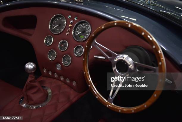 The interior, dashboard of a new AK 427 Demo car "Timmy" with the generation III Supalite chassis is displayed at the British Motor Show at...
