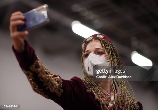 Member of Team Algeria poses for a photo prior to the opening ceremony of the Tokyo 2020 Paralympic Games at the Olympic Stadium on August 24, 2021...