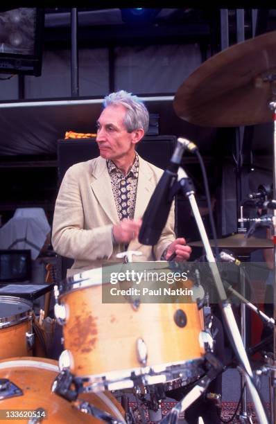 British musician Charlie Watts of the Rolling Stones performs on stage during the band's 'Voodoo Lounge' tour, late 1994.