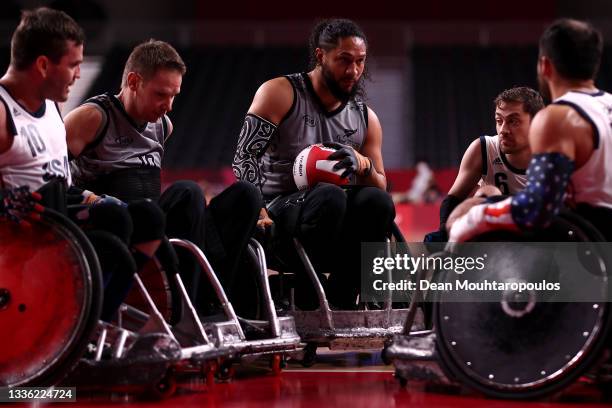 Hayden Barton-Cootes of New Zealand battles for the ball with Joshua Wheeler, Jeff Butler and Charles Aoki of United States of America during the...