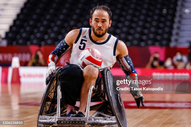 Charles Aoki of Team United States takes on Team New Zealand during their Group B wheelchair rugby match on day 1 of the Tokyo 2020 Paralympic Games...