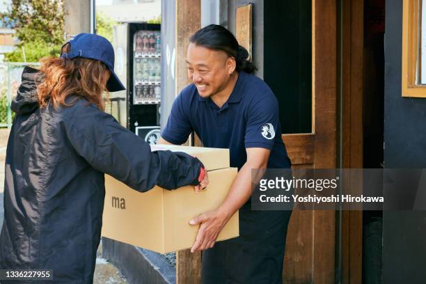 portrait of a small business owner - delivery ストックフォトと画像
