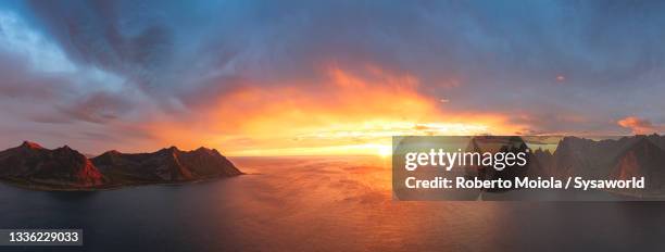 fjords under lights of midnight sun, senja, norway - midnight sun stock pictures, royalty-free photos & images
