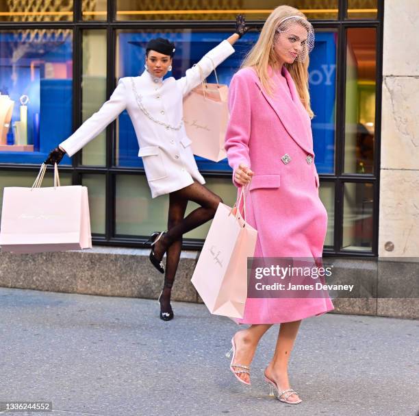 Lameka Fox and Daphne Groeneveld seen during a photoshoot on 5th Avenue on August 24, 2021 in New York City.