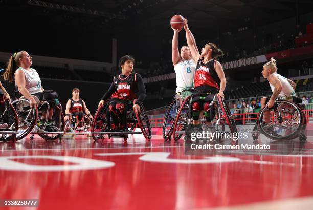 Georgia Munro-Cook of Team Australia looks to shoot against Mari Amimoto of Team Japan in the second half during the Women's Wheelchair Basketball...