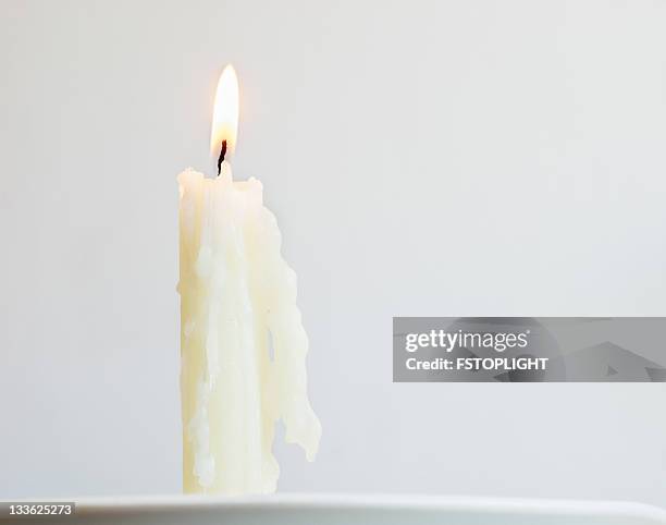 white candle - lighting candle stock pictures, royalty-free photos & images