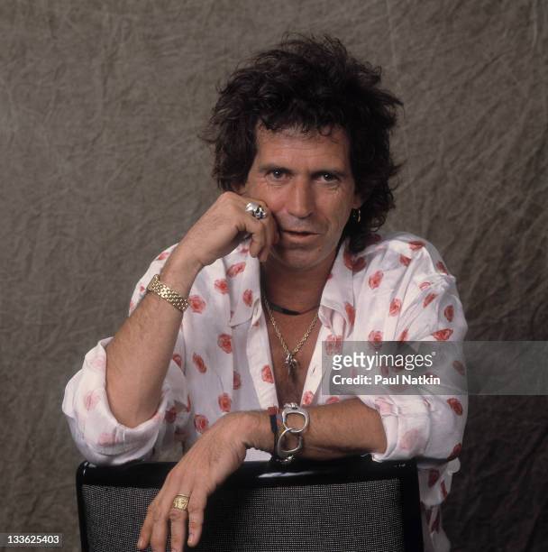 Portrait of British musician Keith Richards as he lean on the back of a chair, Los Angeles, California, September 1989.
