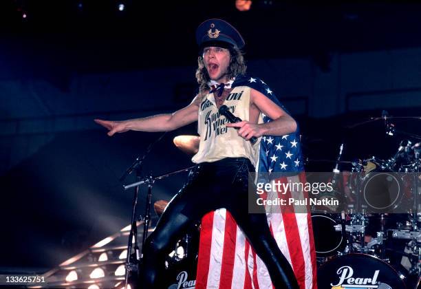 American musician Jon Bon Jovi performs on stage, Illinois, early March, 1987.