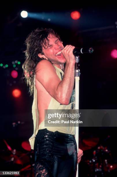 American musician Jon Bon Jovi performs on stage, Illinois, early March, 1987.