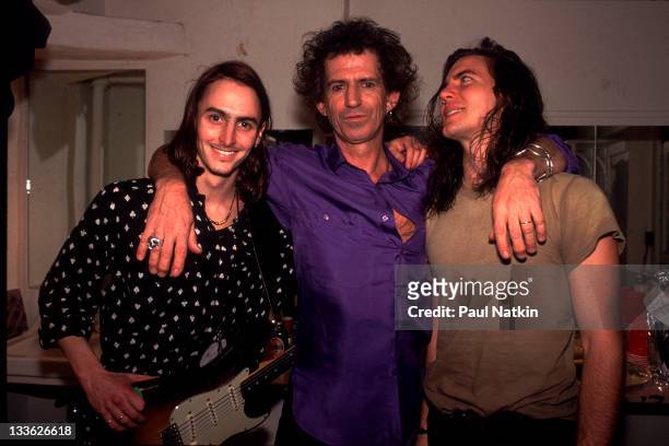 British musician Keith Richards poses backstage with American musicians Mike McCready and Eddie Vedder, of the band Pearl Jam, at the Academy, New...