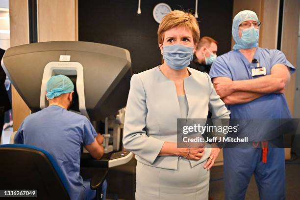 Scotland’s First Minister Nicola Sturgeon visits a mock theatre set up with innovative new medical equipment, including robotic surgery devices, at...