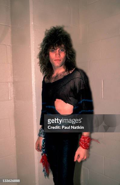 Portrait of American musician Jon Bon Jovi backstage before a performance at the Rosemont Horizon, Rosemont, Illinois, May 20, 1984.