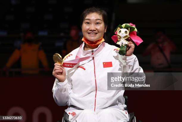 Gold medalist Shumei Tan of Team China poses during the Women's Sabre Individual Category B Medal Ceremony on day 1 of the Tokyo 2020 Paralympic...