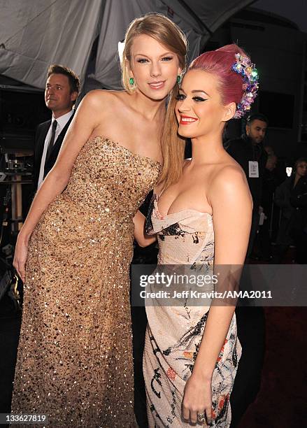 Taylor Swift and Katy Perry arrive at the 2011 American Music Awards at the Nokia Theatre L.A. LIVE on November 20, 2011 in Los Angeles, California.