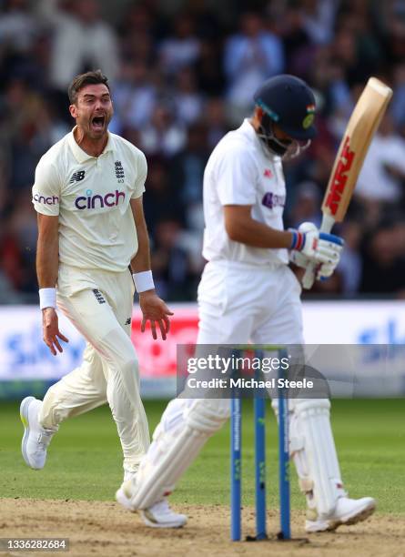 James Anderson of England celebrates taking the wicket of Virat Kohli of India during day one of the Third Test Match between England and India at...