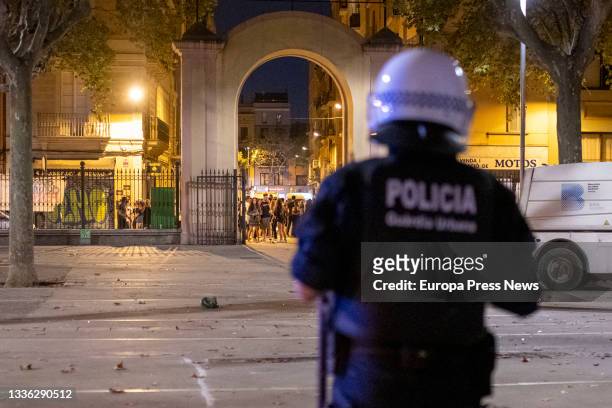 An agent of Mossos d' Esquadra, during the first night of the Fiestas de Sants, on 25 August, 2021 in Barcelona, Catalonia, Spain. Most of the...