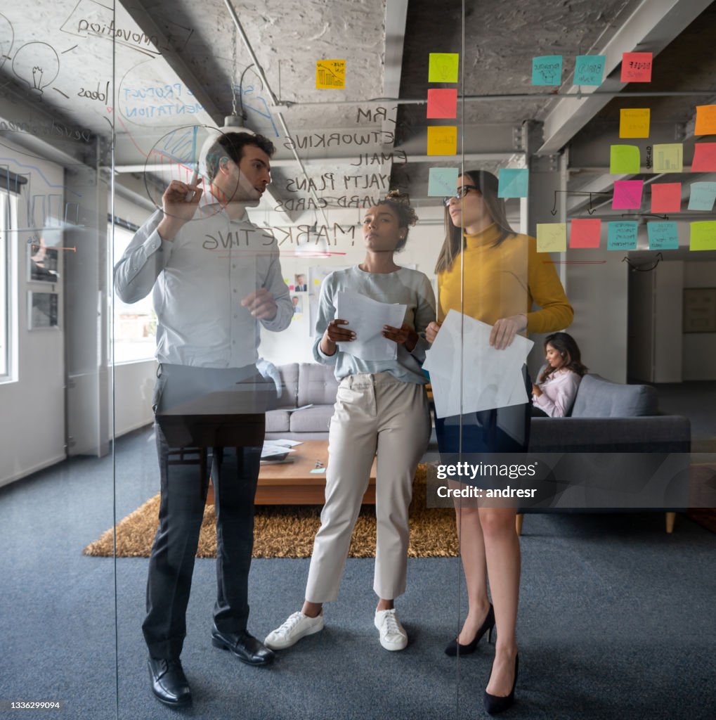 Business team discussing a marketing strategy in a meeting at the office