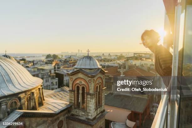 woman looking at scenic view of istanbul - istanbul province stock pictures, royalty-free photos & images