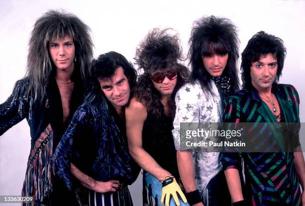 Portrait of American rock band Bon Jovi backstage before a performance, Illinois, early March, 1987. Pictured are, from left, David Bryan, Tico...