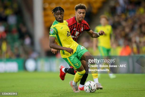 Morgan Rogers of Bournemouth closes down Bali Mumba of Norwich City during the Carabao Cup 2nd Round match between Norwich FC and AFC Bournemouth at...