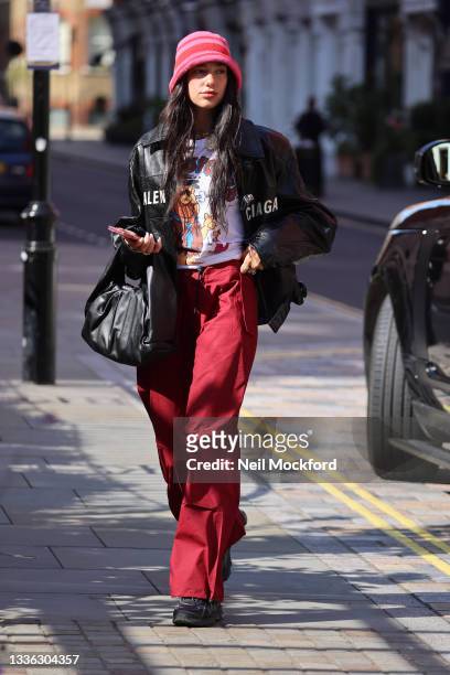 Dua Lipa seen arriving back at a hotel on August 25, 2021 in London, England.