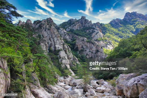 scenic view of rocky mountains against sky,kumgangsan,kangwon,north korea - north korea landscape - fotografias e filmes do acervo
