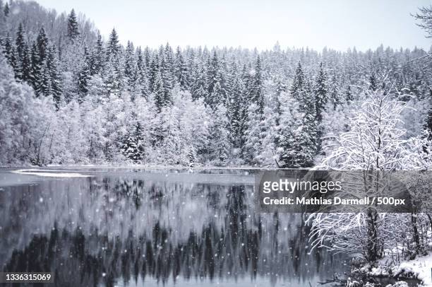 scenic view of frozen lake against sky during winter - darmell bildbanksfoton och bilder