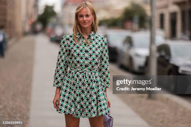 Vivien Wysocki wearing Zara mini green flower dress and Zara lilac bag on August 18, 2021 in Berlin, Germany.