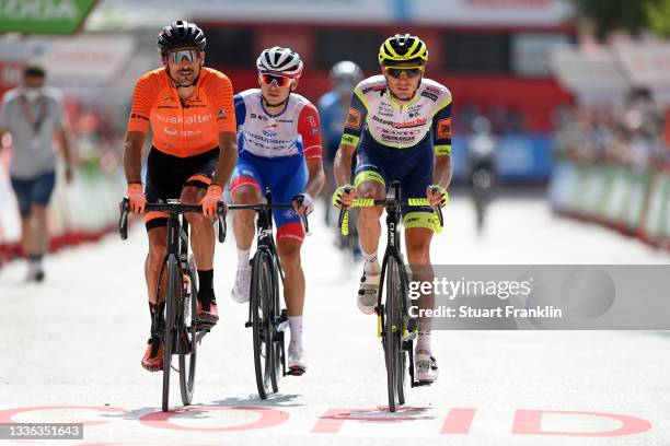 Luis Ángel Maté Mardones of Spain and Team Euskaltel - Euskadi and Rein Taaramae of Estonia and Team Intermarché - Wanty - Gobert Matériaux crosses...