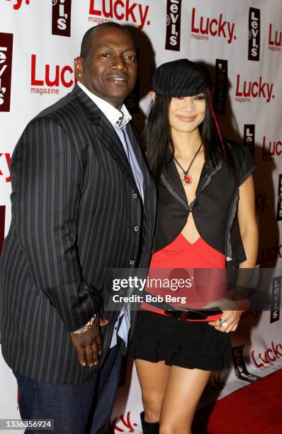 American musician, singer, record producer, entrepreneur, and television personality Randy Jackson and Chinese-American actress Bai Ling pose for a...