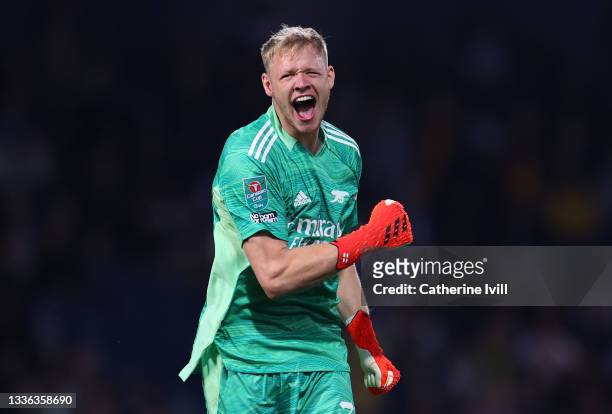 Arsenal goalkeeper Aaron Ramsdale celebrates the first goal during the Carabao Cup Second Round match between West Bromwich Albion and Arsenal at The...