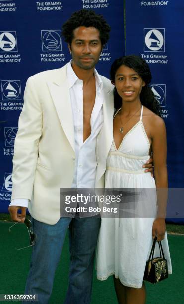 American R&B/neo soul singer-songwriter and actor Eric Benet and his daughter India Benet arrive at the GRAMMY Foundation's A Starry Night Benefit...