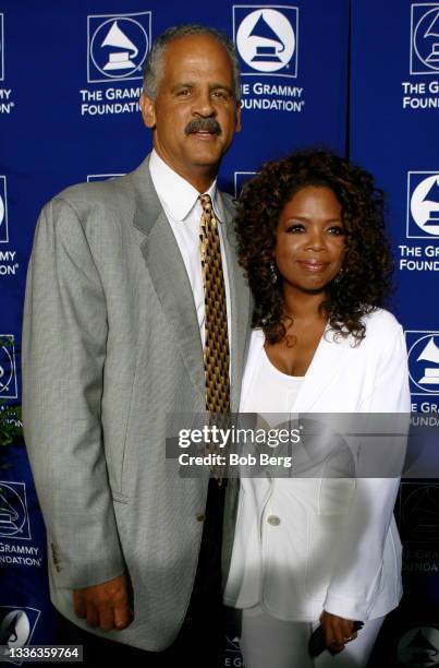 American educator, author, businessman, and public speaker Stedman Graham and American talk show host, television producer, actress, author, and...