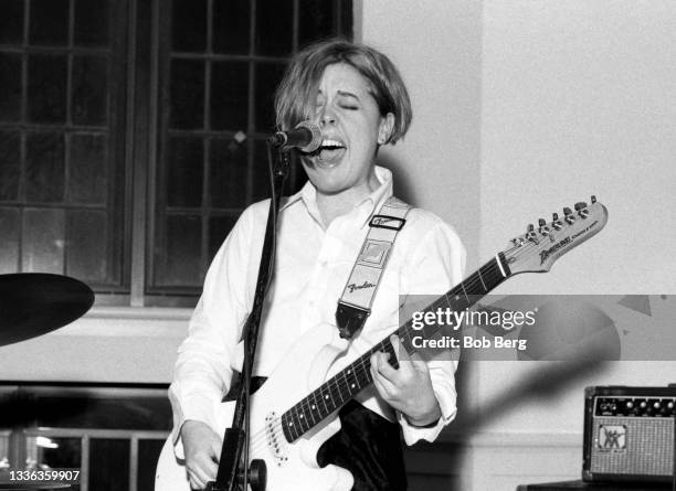 American singer, songwriter, and guitarist Corin Tucker, of the American rock band Sleater-Kinney, plays on stage circa March, 1996 in Byrn Mawr,...