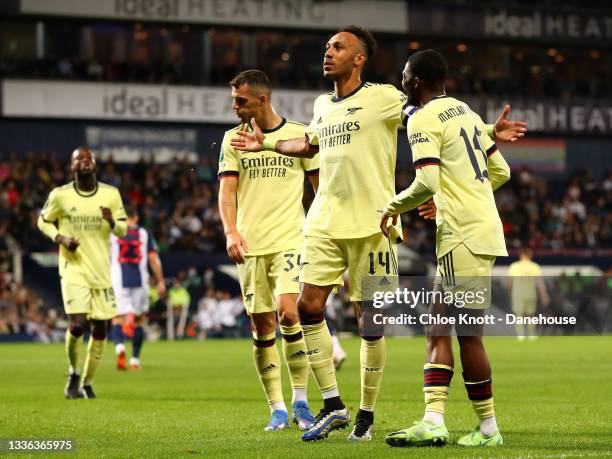 Pierre-Emerick Aubameyang of Arsenal celebrates scoring his teams fifth goal during the Carabao Cup Second Round match between West Bromwich Albion...