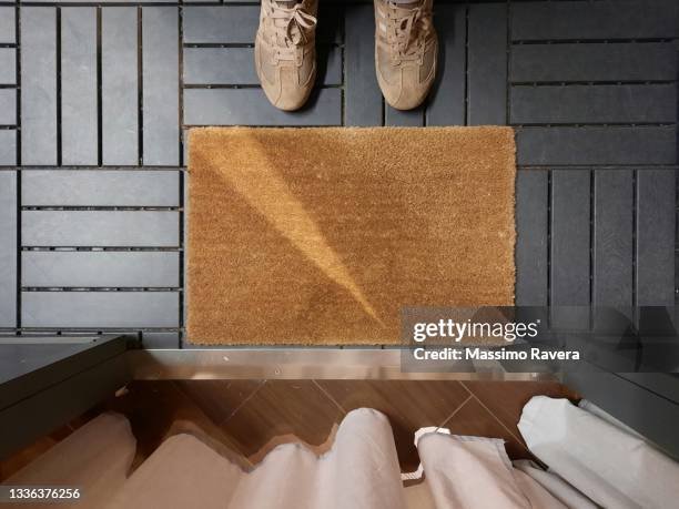 the door mat - doormat stock pictures, royalty-free photos & images