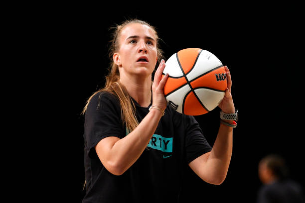 Sabrina Ionescu of the New York Liberty warms up before the first half against the Phoenix Mercury at Barclays Center on August 25, 2021 in the...